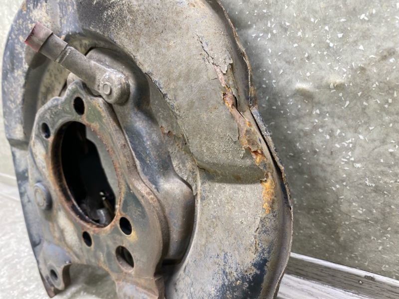 Тормозной механизм левый JUKE 10-19 2011 1.6 MR16DDT