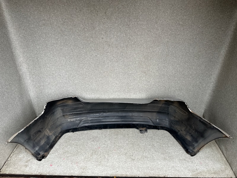 Бампер задний TIIDA/VERSA C11 04-11 Седан