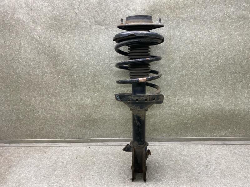 Амортизатор передний левый TRIBECA B9 05-07