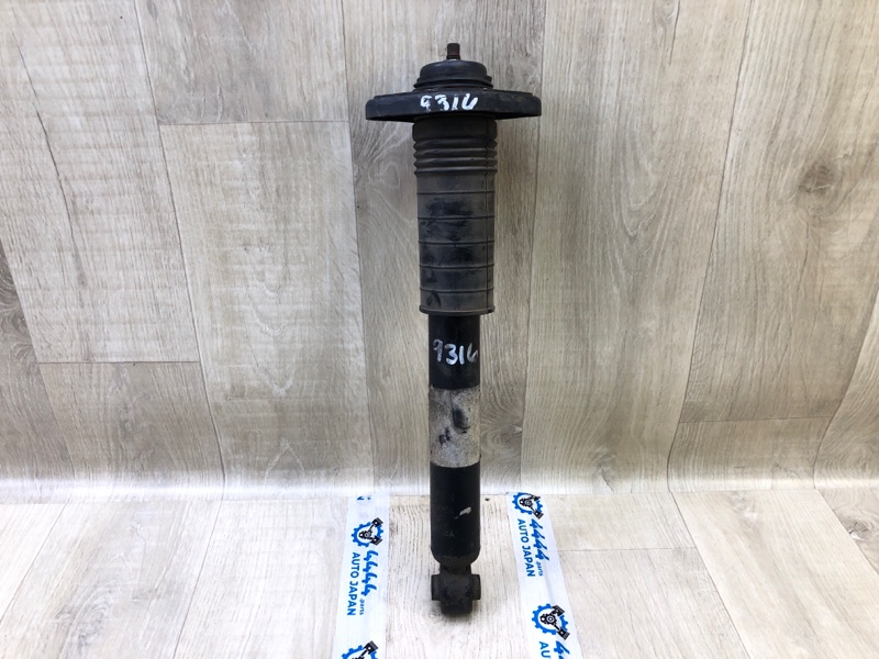 Амортизатор задний NISSAN PATHFINDER R52 12-21 2013 3.5 VQ35DE E62103KA0A Б/У