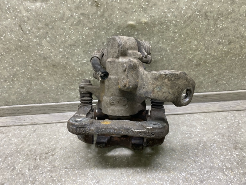 Суппорт тормозной задний правый CIVIC 4D 06-11