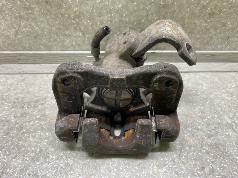 Суппорт тормозной задний правый HONDA CIVIC 4D 06-11