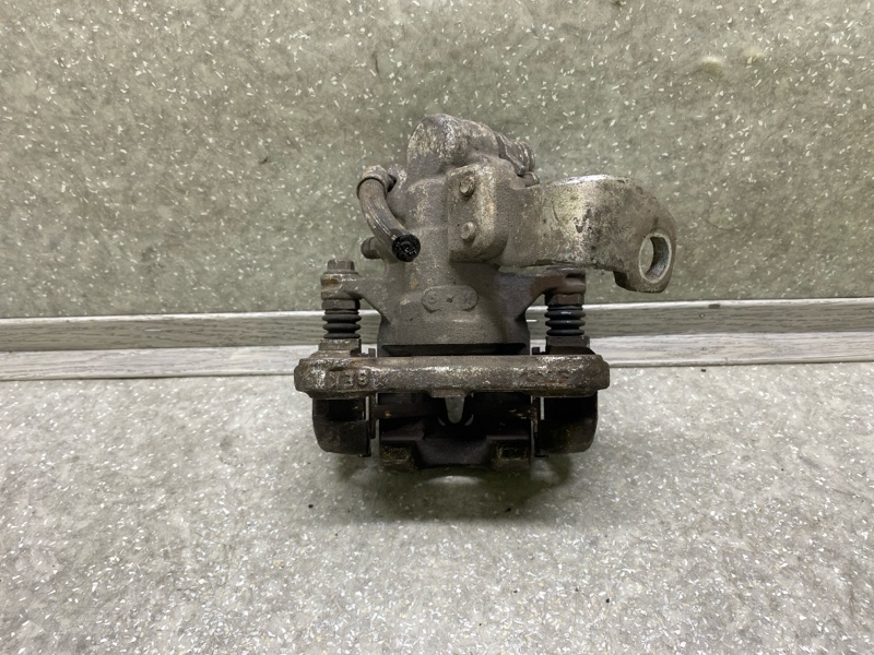 Суппорт тормозной задний правый HONDA CIVIC 4D 06-11