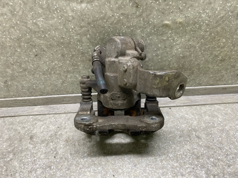 Суппорт тормозной задний правый CIVIC 4D 06-11