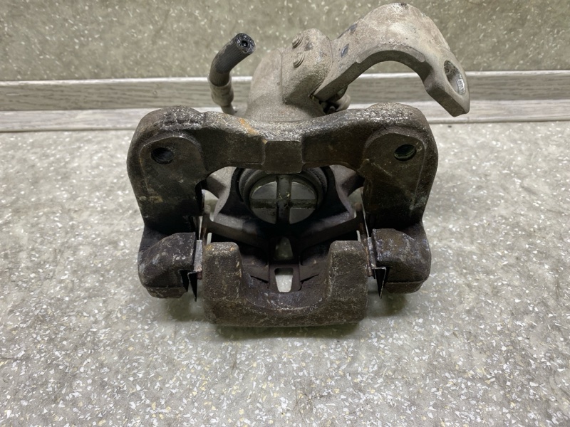 Суппорт тормозной задний правый HONDA CIVIC 4D 06-11