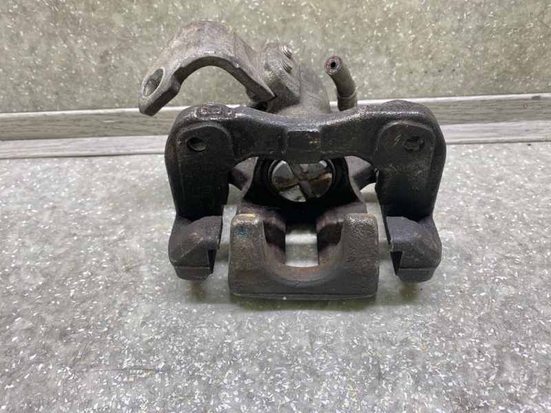 Суппорт тормозной задний левый HONDA CIVIC 4D 06-11