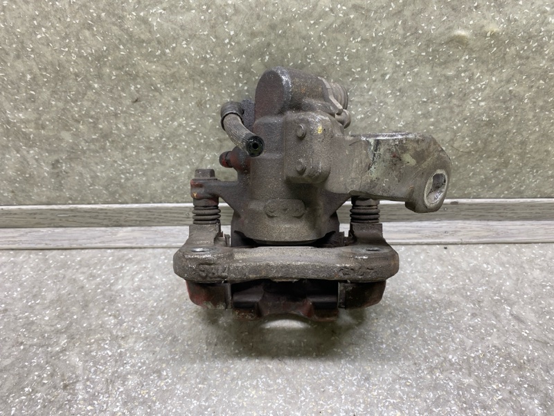 Суппорт тормозной задний правый CIVIC 4D 06-11