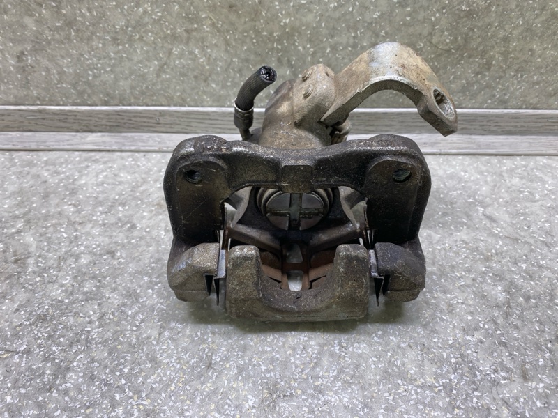 Суппорт тормозной задний правый HONDA CIVIC 4D 06-11