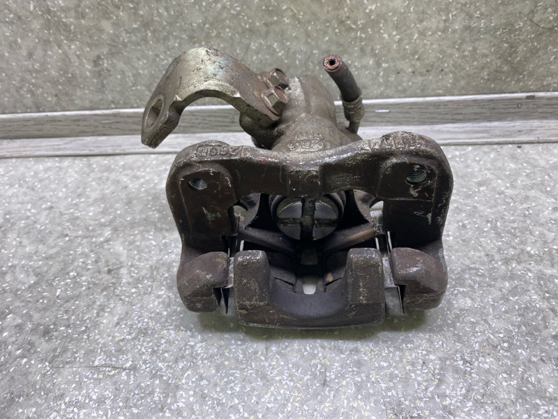 Суппорт тормозной задний левый HONDA CIVIC 4D 06-11