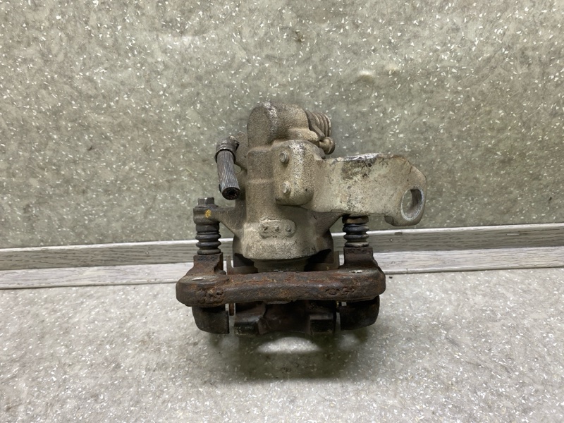 Суппорт тормозной задний правый CIVIC 4D 06-11