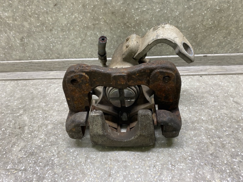 Суппорт тормозной задний правый HONDA CIVIC 4D 06-11