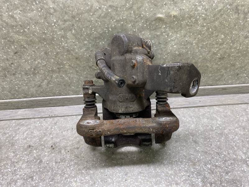 Суппорт тормозной задний правый CIVIC 4D 06-11