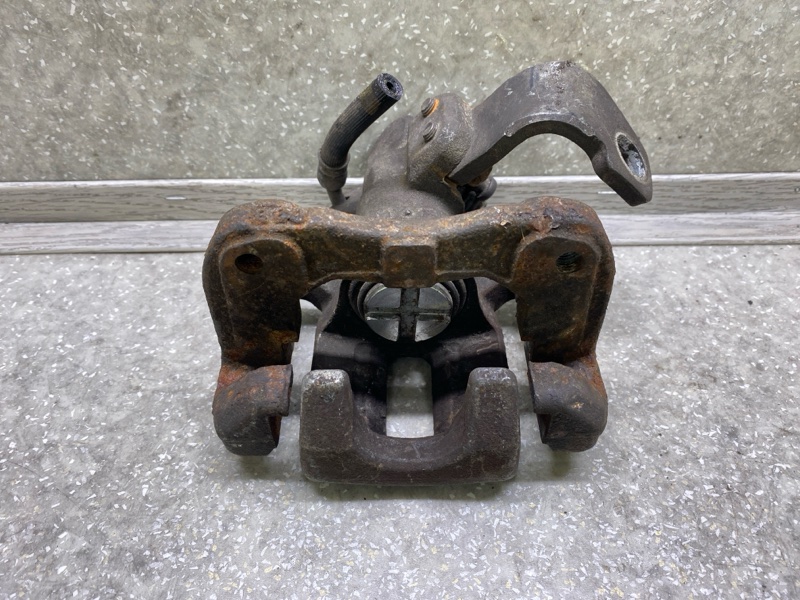 Суппорт тормозной задний правый HONDA CIVIC 4D 06-11