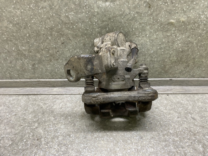 Суппорт тормозной задний левый CIVIC 4D 06-11