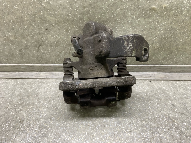 Суппорт тормозной задний правый CIVIC 4D 06-11