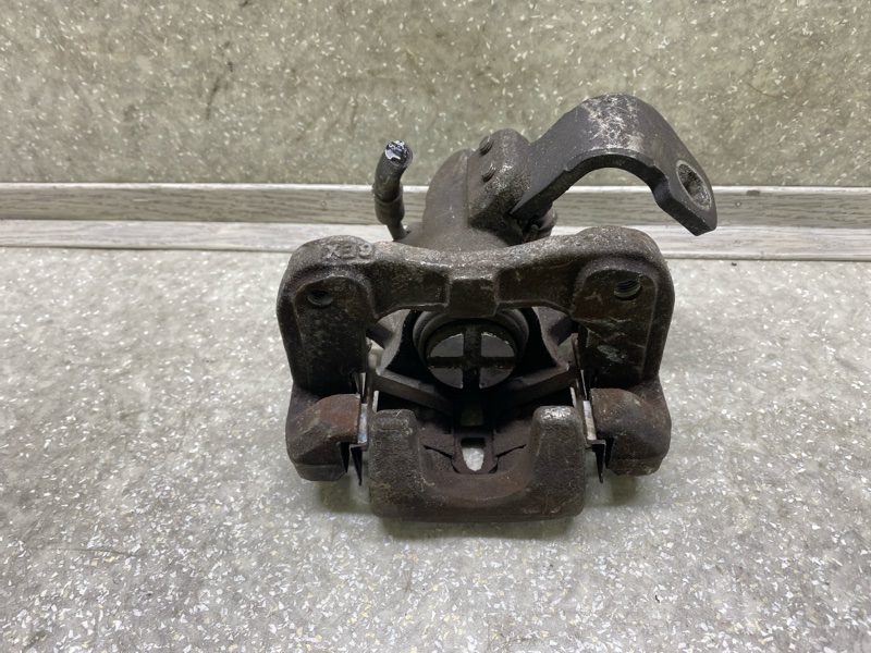 Суппорт тормозной задний правый HONDA CIVIC 4D 06-11