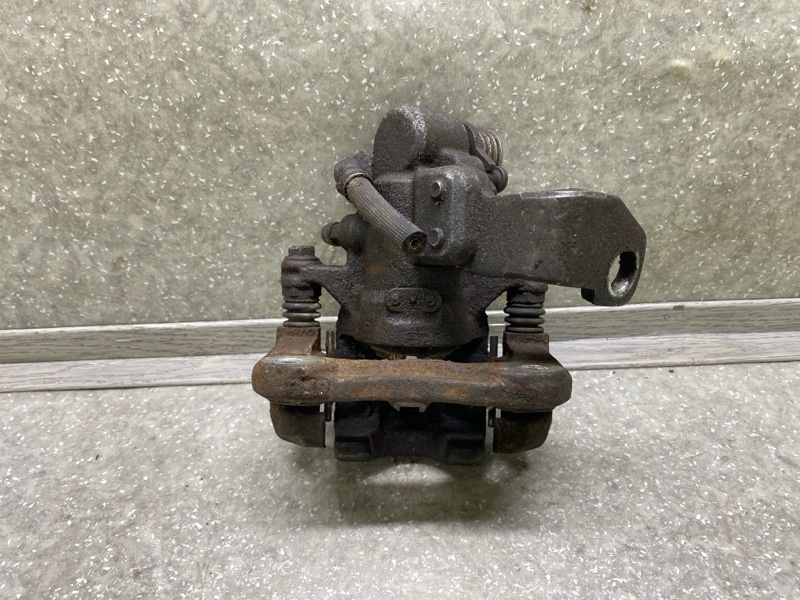 Суппорт тормозной задний правый CIVIC 4D 06-11