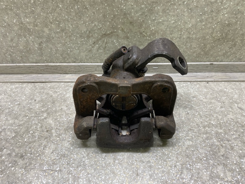 Суппорт тормозной задний правый HONDA CIVIC 4D 06-11