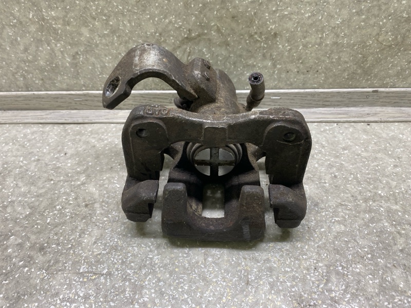 Суппорт тормозной задний левый HONDA CIVIC 4D 06-11