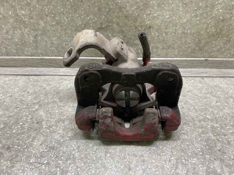 Суппорт тормозной задний левый HONDA CIVIC 4D 06-11