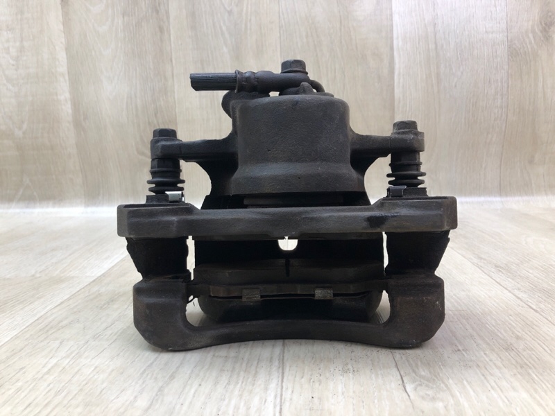 Суппорт тормозной передний левый TOYOTA COROLLA 150 06-13 1.8 2ZRFE