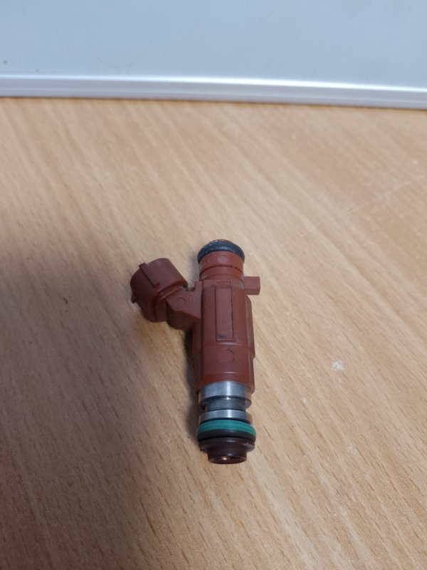 Запчасть форсунка топливная NISSAN MICRA 03-11 16600-AX000 Б/У Форсунка топливная NISSAN MICRA 03-11 16600-AX000 Б/У