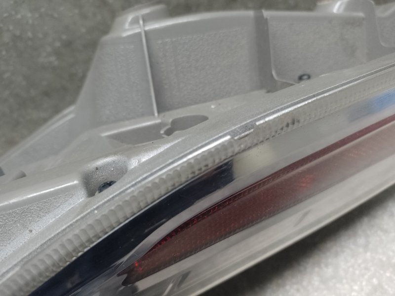 Фонарь наружный задний левый LEAF 10-17 2011 EM61