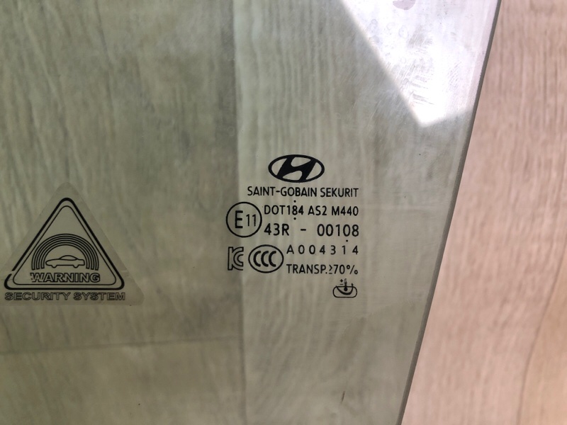 Стекло двери переднее левое TUCSON TL 15-20 2015 G4FJ 1.6