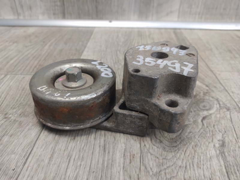 Натяжитель ремня генератора L200 06-14