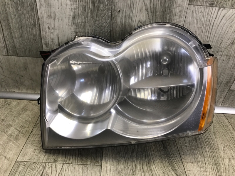 Фара левая JEEP GRAND CHEROKEE 04-10 55156351AF Б/У