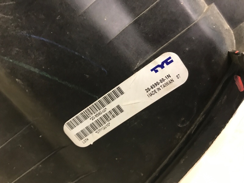 Фара левая GRAND CHEROKEE 04-10