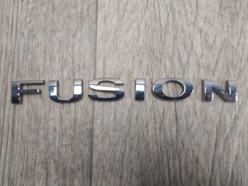 Эмблема задняя FUSION (USA) 06-12 Эмблема задняя FUSION (USA) 06-12