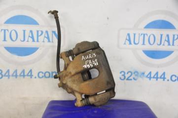 Суппорт тормозной передний левый TOYOTA AURIS 06-12