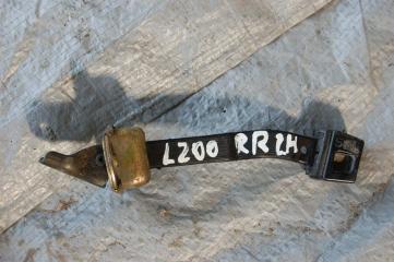 Ограничитель двери задний левый L200 06-14