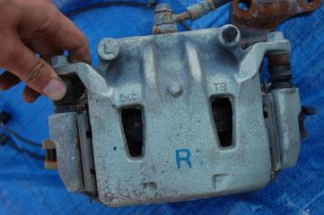 Суппорт тормозной передний левый NISSAN LEAF 10-17