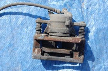 Суппорт тормозной передний левый MICRA 03-11