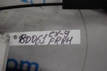 Замок двери передний правый CX-9 06-16