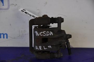 Запчасть суппорт тормозной задний левый HYUNDAI TUCSON 04-10