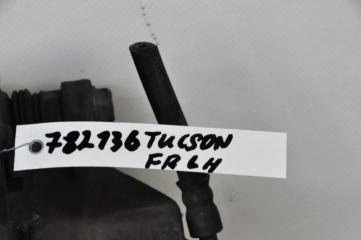 Суппорт тормозной передний левый TUCSON 04-10