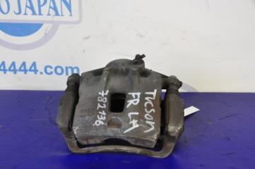 Суппорт тормозной передний левый TUCSON 04-10