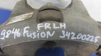 Суппорт тормозной передний левый FUSION 14- 2015 Седан 2.5