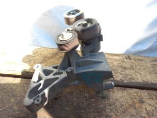 Натяжитель ремня генератора правый MITSUBISHI LANCER X 10 07-15