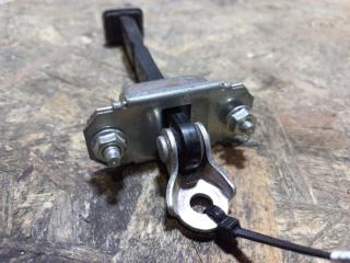 Ограничитель двери передний левый LEGACY 09-15 BM