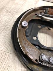 Тормозной механизм задний левый NV200 USA 13- 2020 M20XUS 2.0 MR20DE