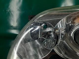 Фара передняя левая AVENSIS 03-08