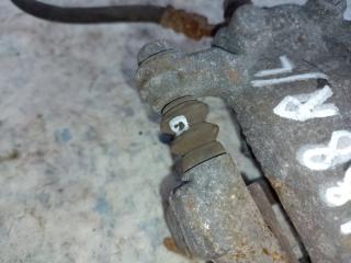 Суппорт тормозной задний левый NISSAN QUEST S 11-17 Минивен E52 3.5