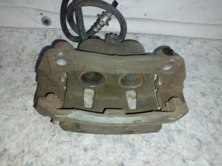 Суппорт тормозной передний левый NV200 USA 13- 2017 2.0 MR20DE