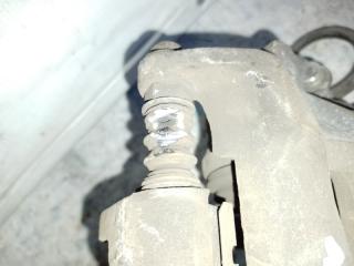 Суппорт тормозной передний левый NISSAN NV200 USA 13- 2.0 MR20DE