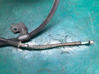 Трос стояночного тормоза левый OUTLANDER XL 05-13