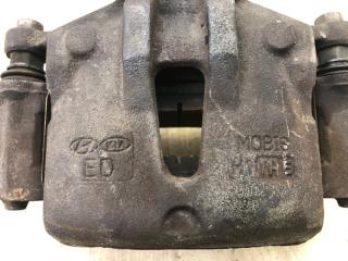 Суппорт тормозной передний левый I30 FD 07-12